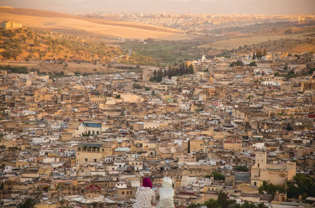 Panoramic view of the ancient city of Fes with its historic rooftops and medina, perfect for those who Explore Fes and Atlas
