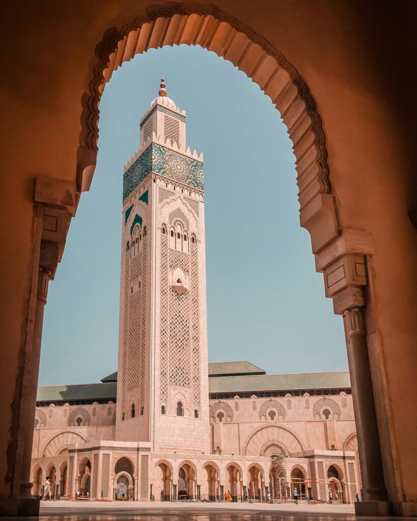 The grand Hassan II Mosque overlooking the Atlantic Ocean, a highlight of Morocco imperial cities tours