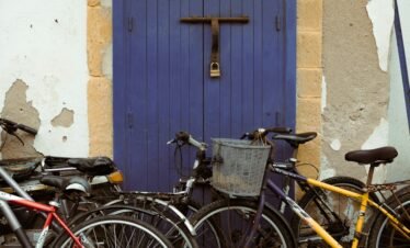 Colorful bicycles parked along the streets of Essaouira during a relaxing Essaouira day trip
