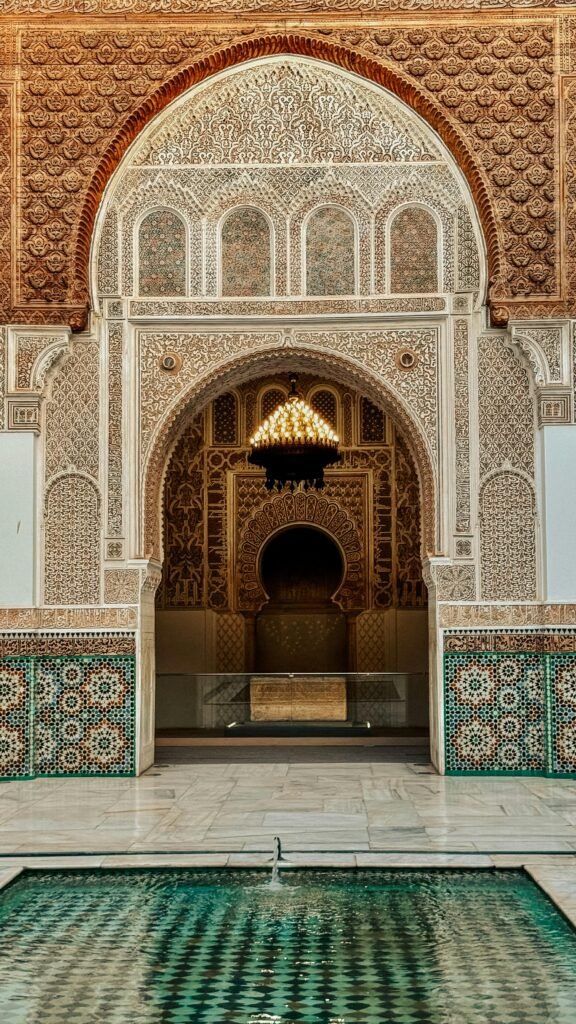 The intricate architecture of Ben Youssef Madrasa, a historic site on Morocco imperial cities tours